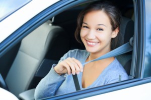 Always fasten your seatbelt. Girl in a car